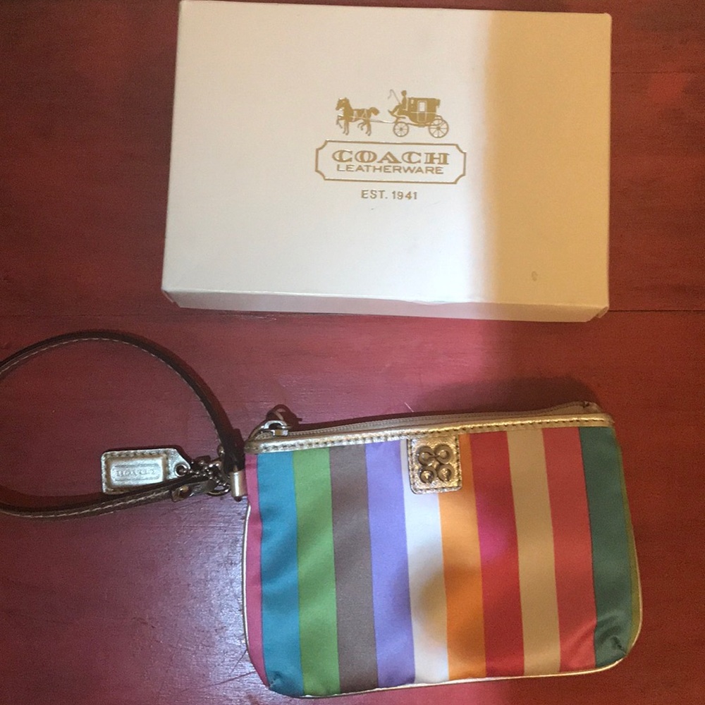 Multi-colored coach wristlet. NEVER USED.